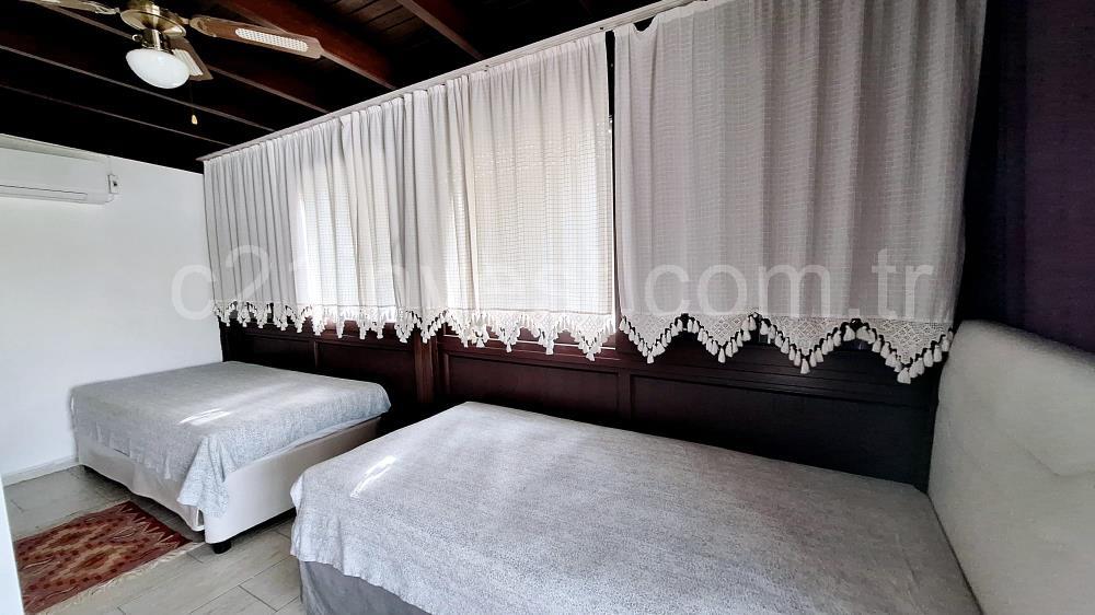 BODRUM GÜMÜŞLÜK GÜMSAN 1 SİTESİNDE YATIRIMLIK ÖZEL PLAJLI SU ARITMALI YAZLIK KIŞLIK  